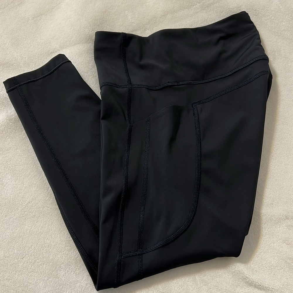 ATHLETA Ultimate Stash Tight Legging
